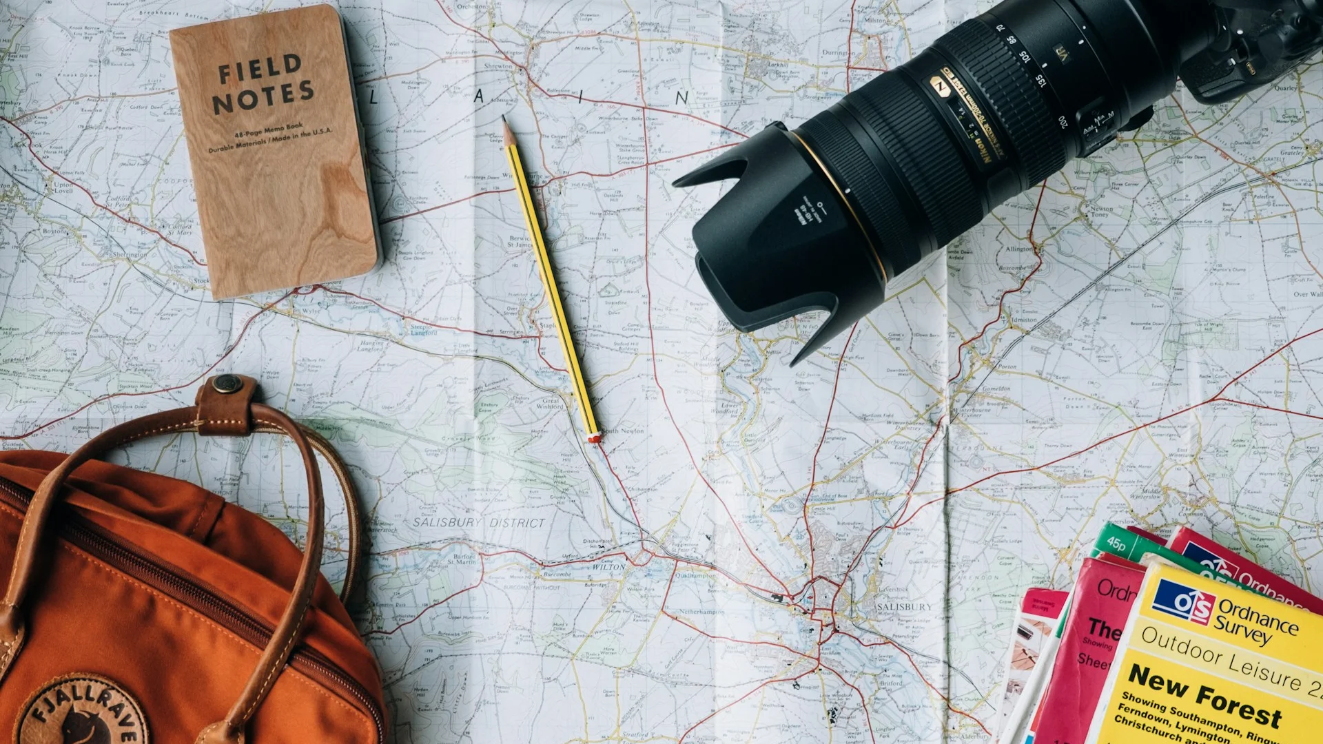 Travel items on a paper map